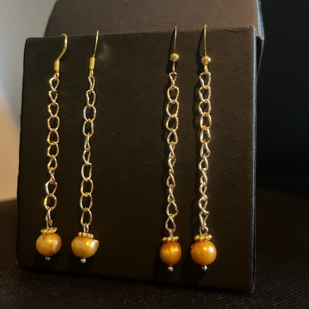 Golden pearl earrings  2 pair in stock.